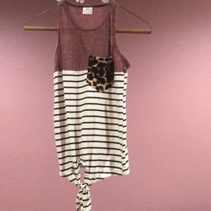 Tank top top half purpleish bottom half striped.